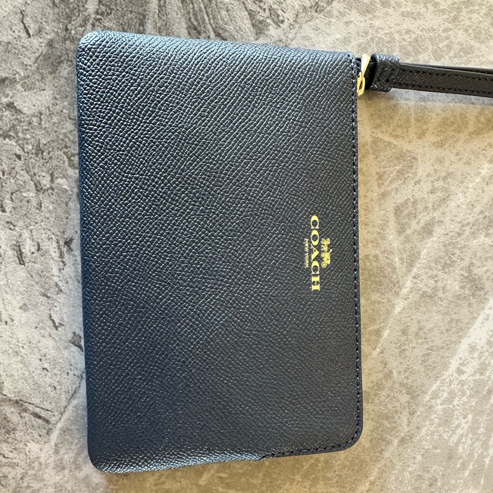 Zip around  corner coach wristlet